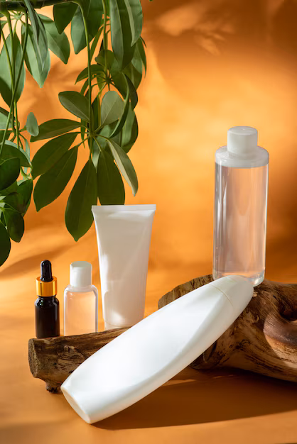 white bottle of shampoo shower gel body cream face oil and tonic